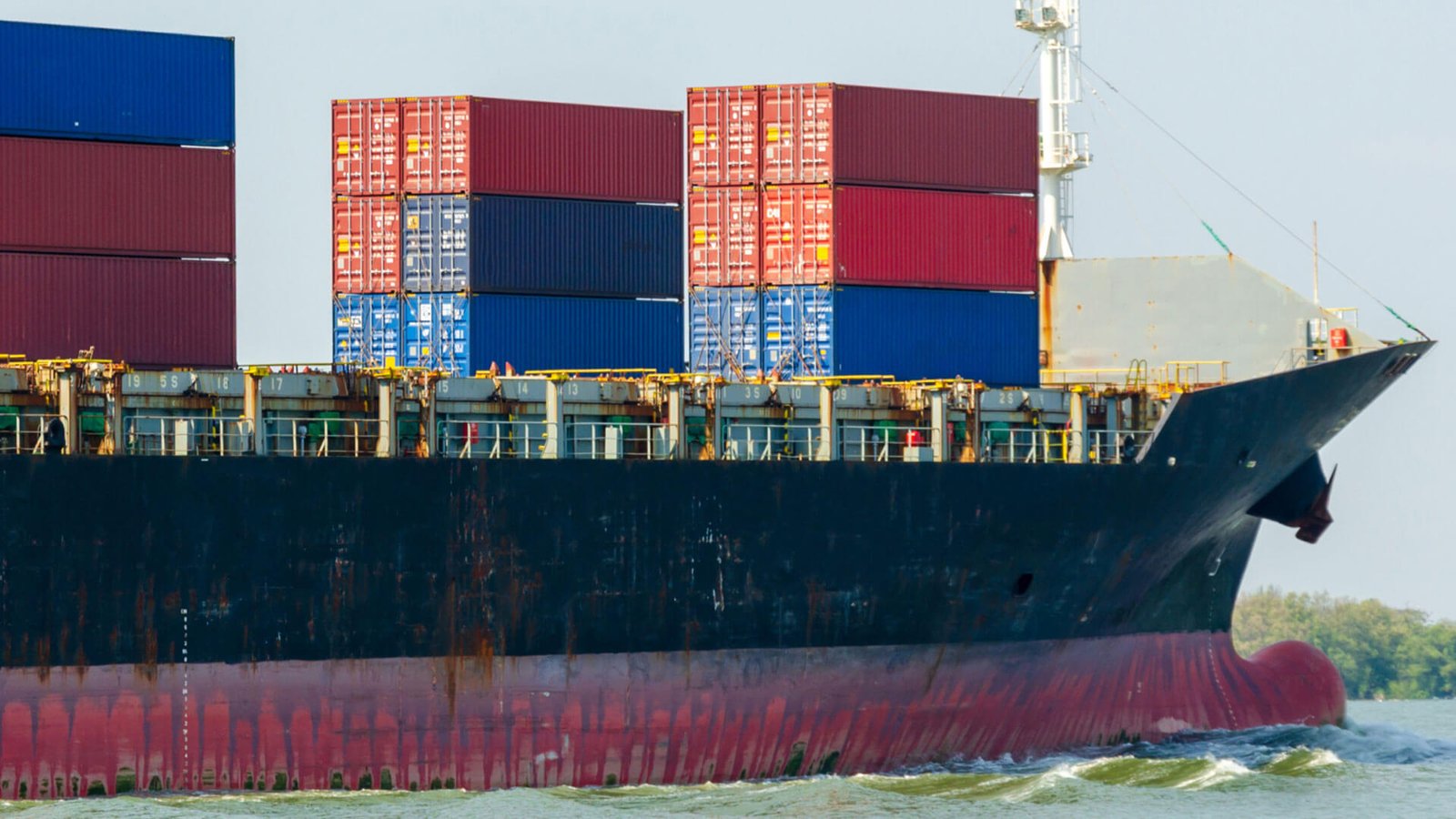 Warehouse workers sorting and palletizing goods for different destinations