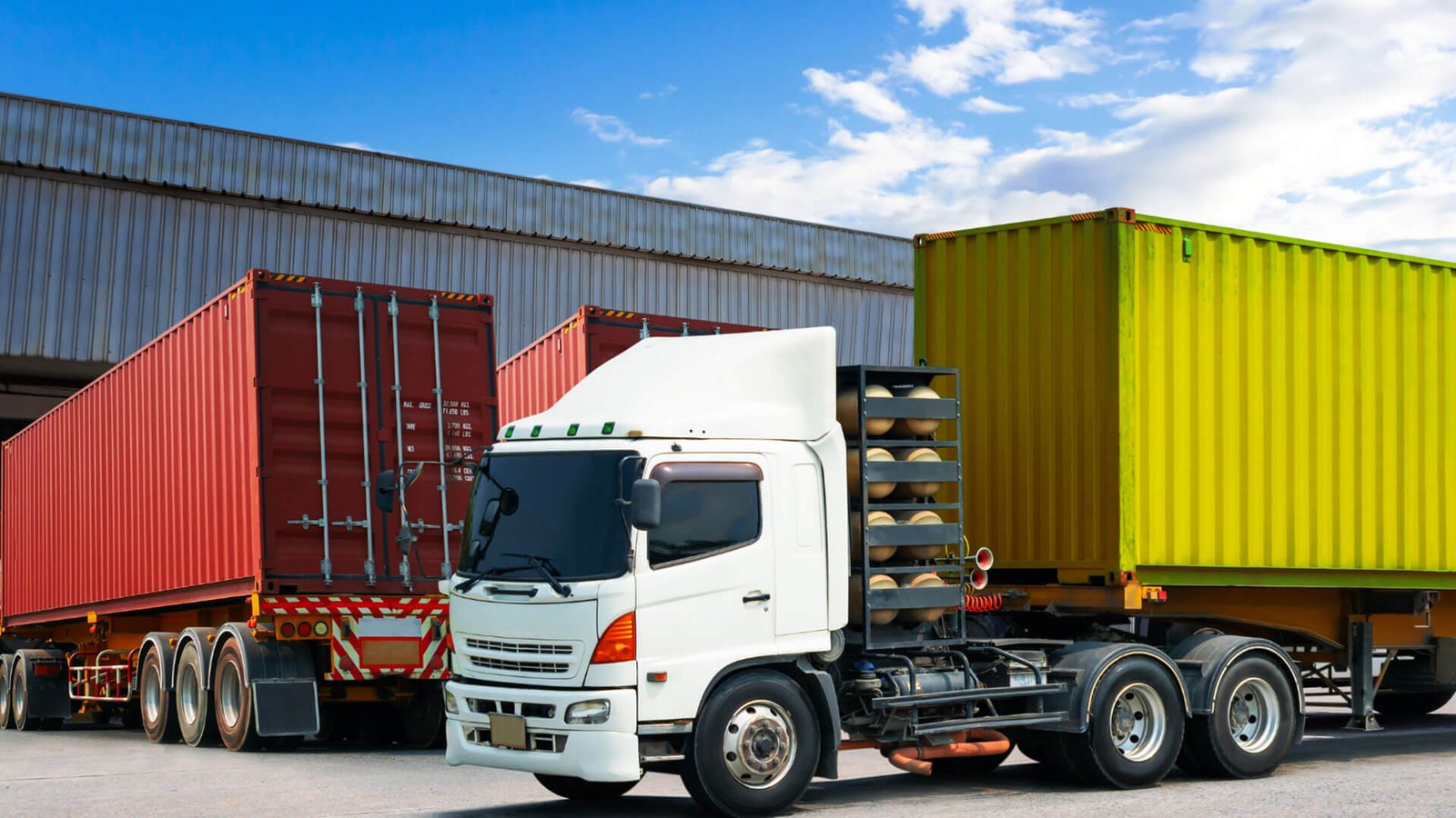 A calculator and a customs declaration form, representing budget calculations