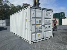 truck delivering container to warehouse