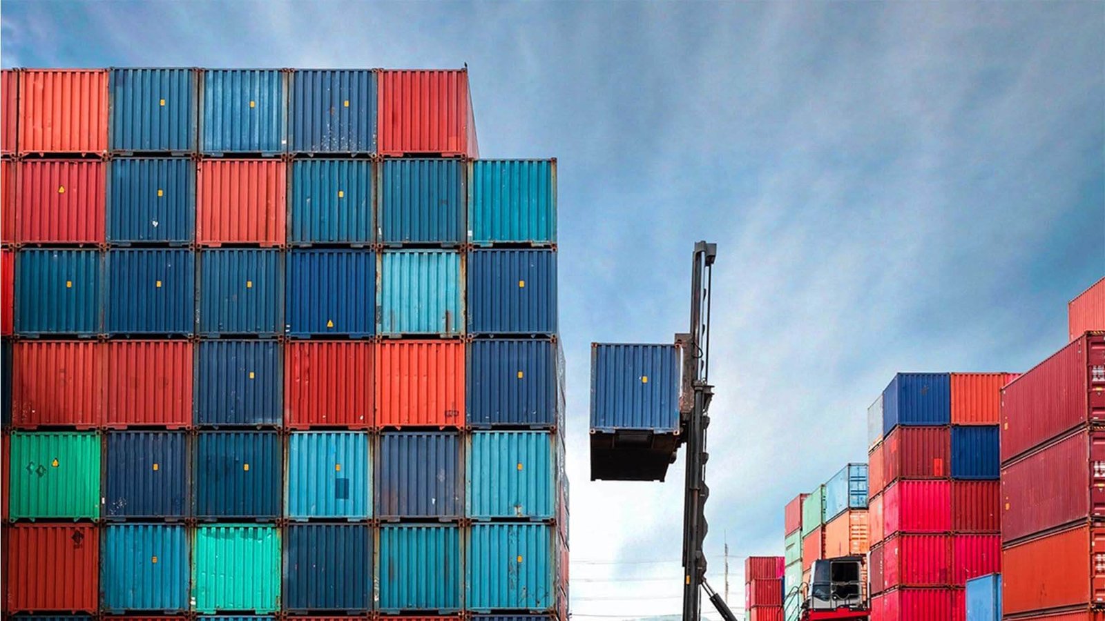 A U.S. importer reviewing their total landed cost spreadsheet