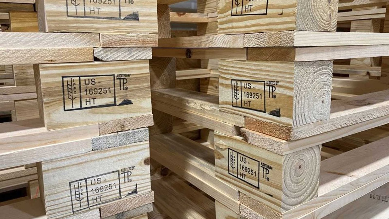 A close-up of an ISPM-15 stamp on a wooden pallet