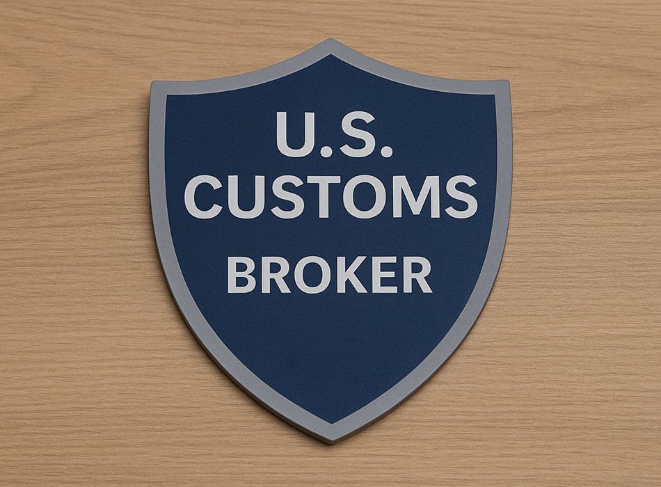 A shield icon with 'U.S. Customs Broker' written on it.
