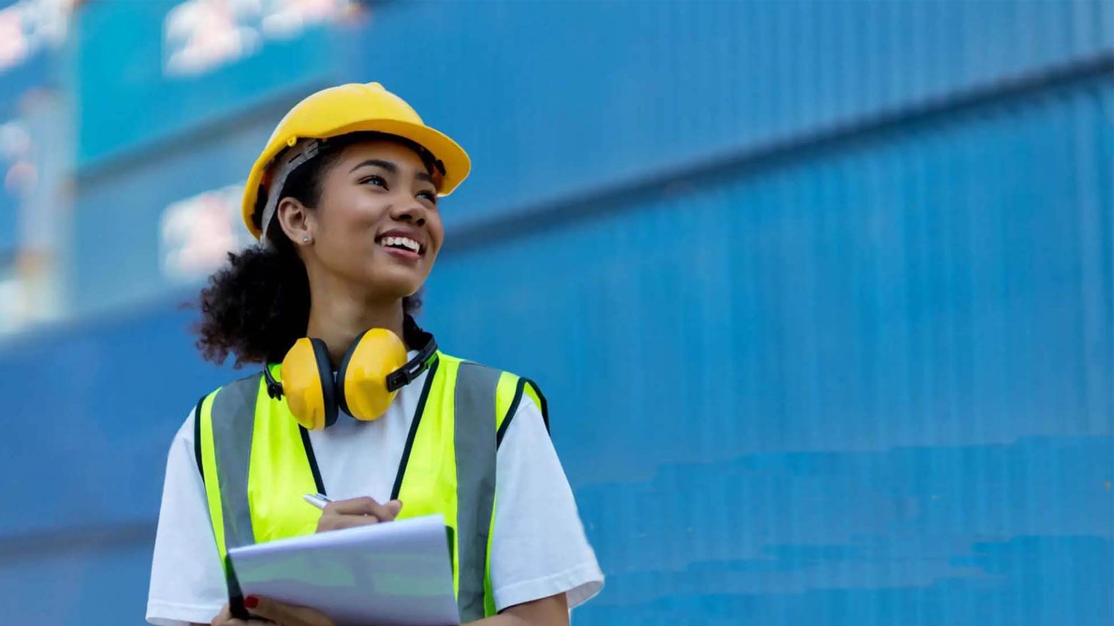A calculator on top of a shipping invoice
